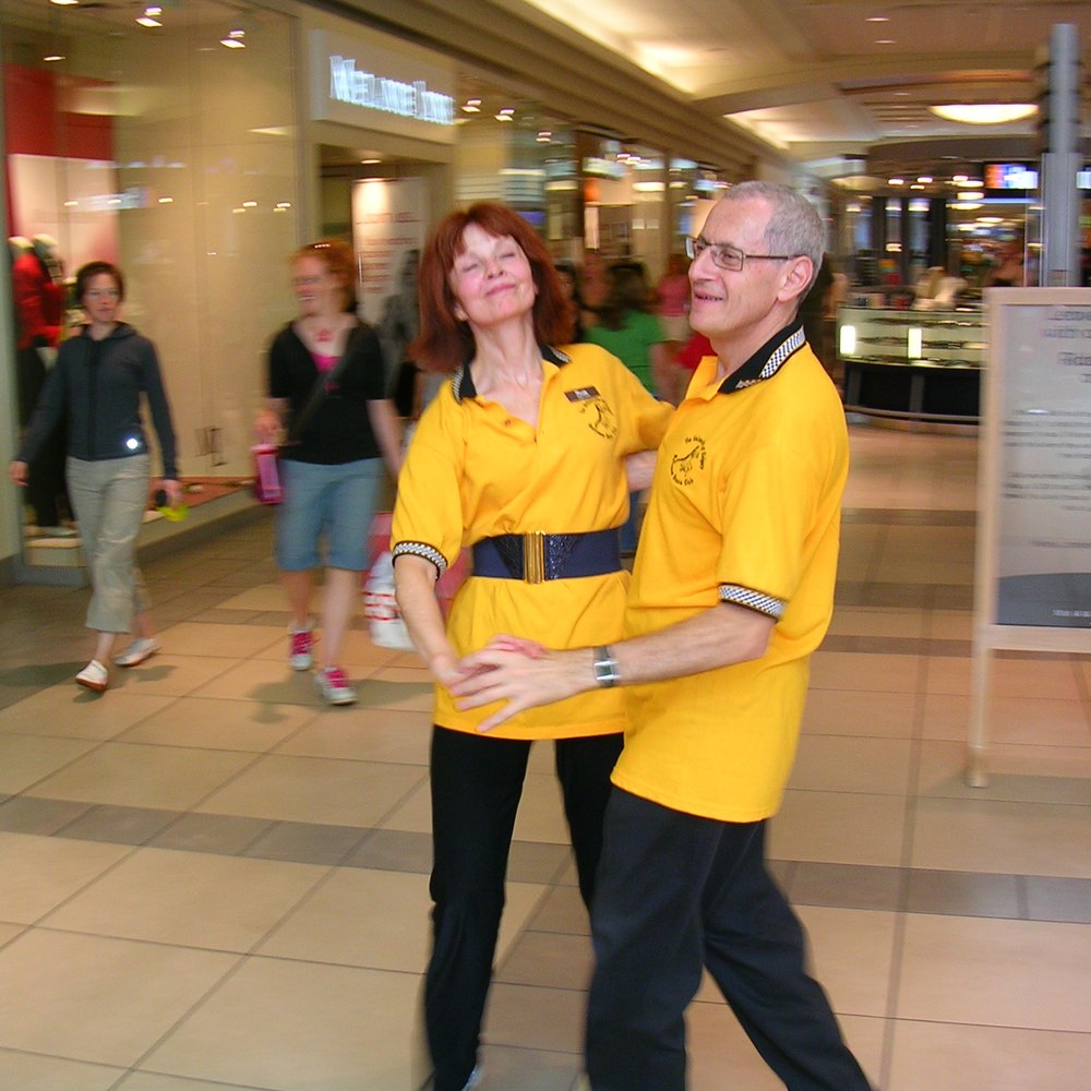 Tibor and Megan of Dance First Calgary dancing together at a social event