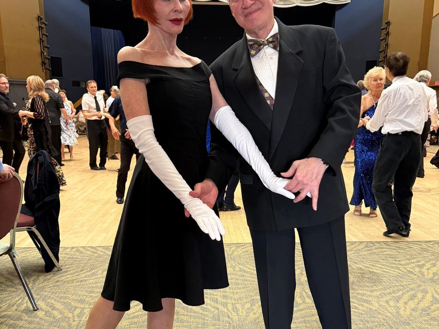 Tibor and Megan dancing an elegant ballroom routine